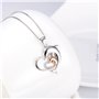Pendentif en argent sterling monté sur chaîne composé de 2 dauphins formant un cœur